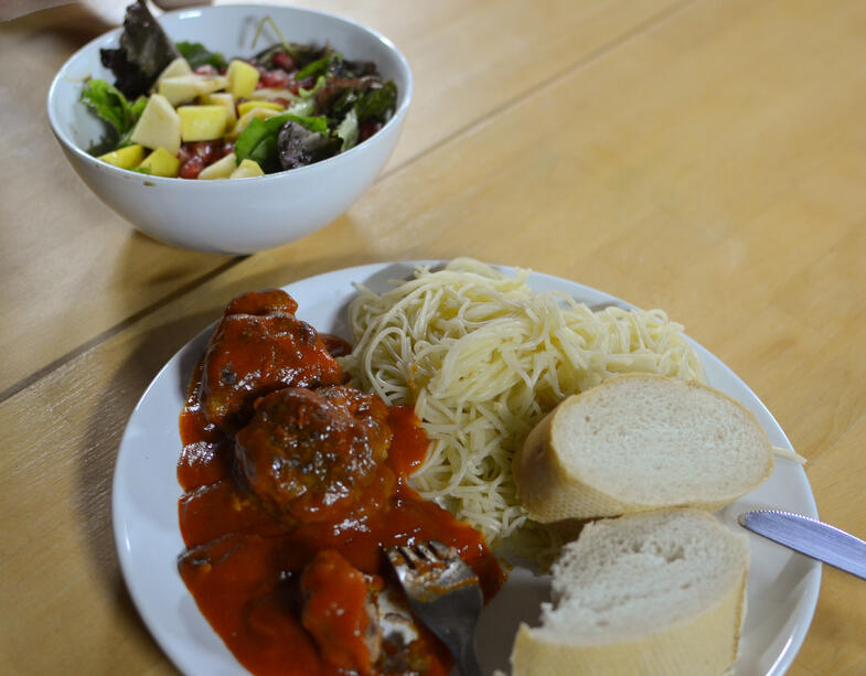 Experiential education students cook a gourmet dinner in our rented home