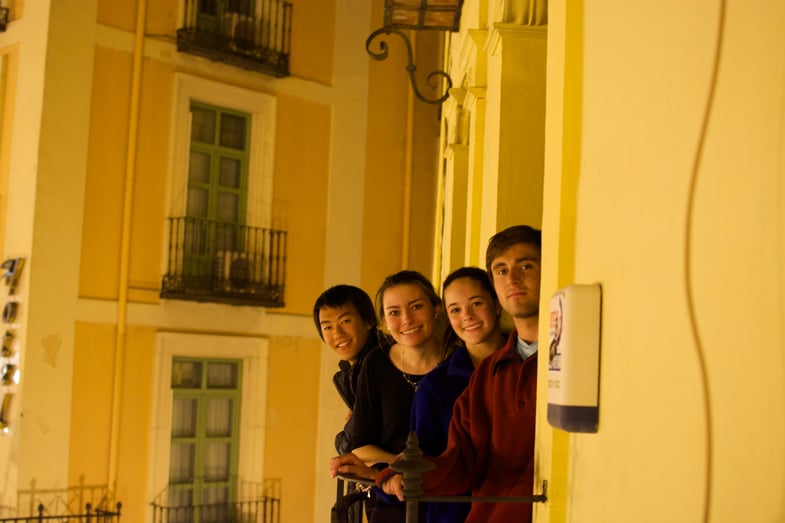 Proctor en Segovia students observe the Plaza Mayor from the school balconies