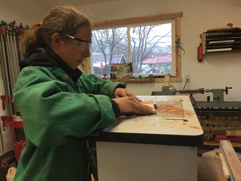 4_Beulah Valley_Theresa Puts Finishing Touches on her Cutting Board.jpg