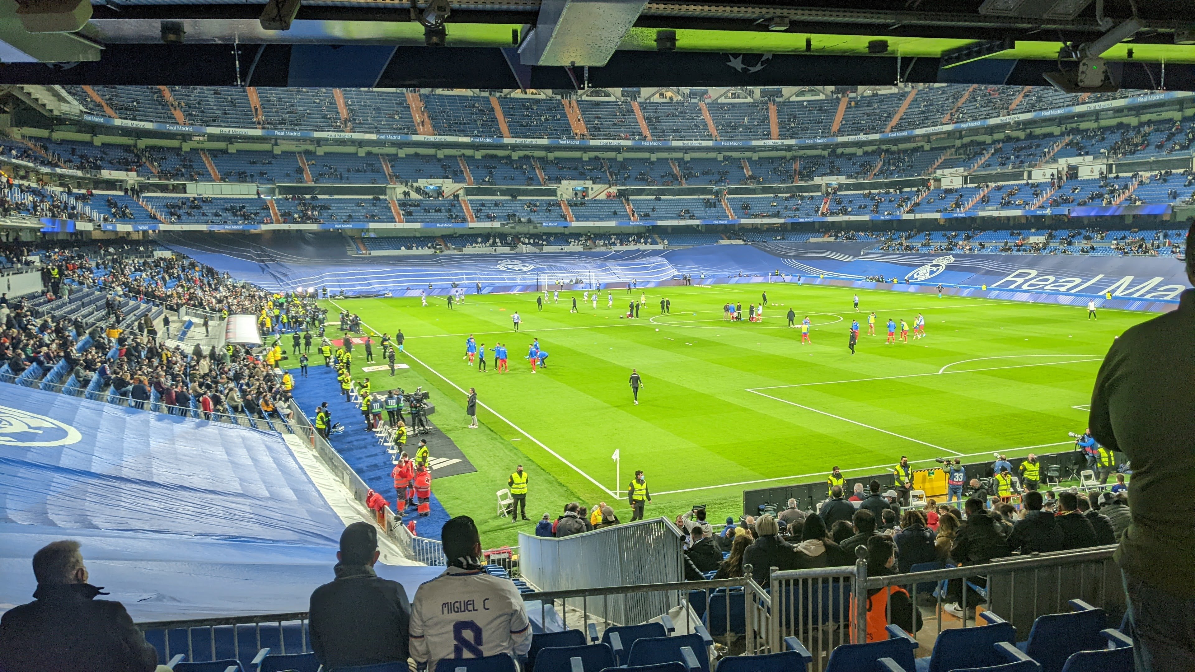 Proctor en Segovia watches a Real Madrid soccer match.