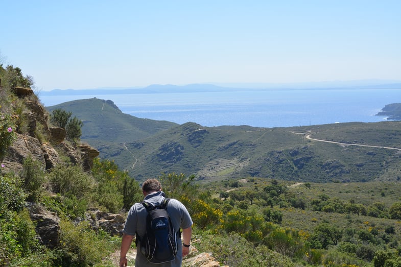 Proctor en Segovia hikes along the Catalan coast near Cadaques